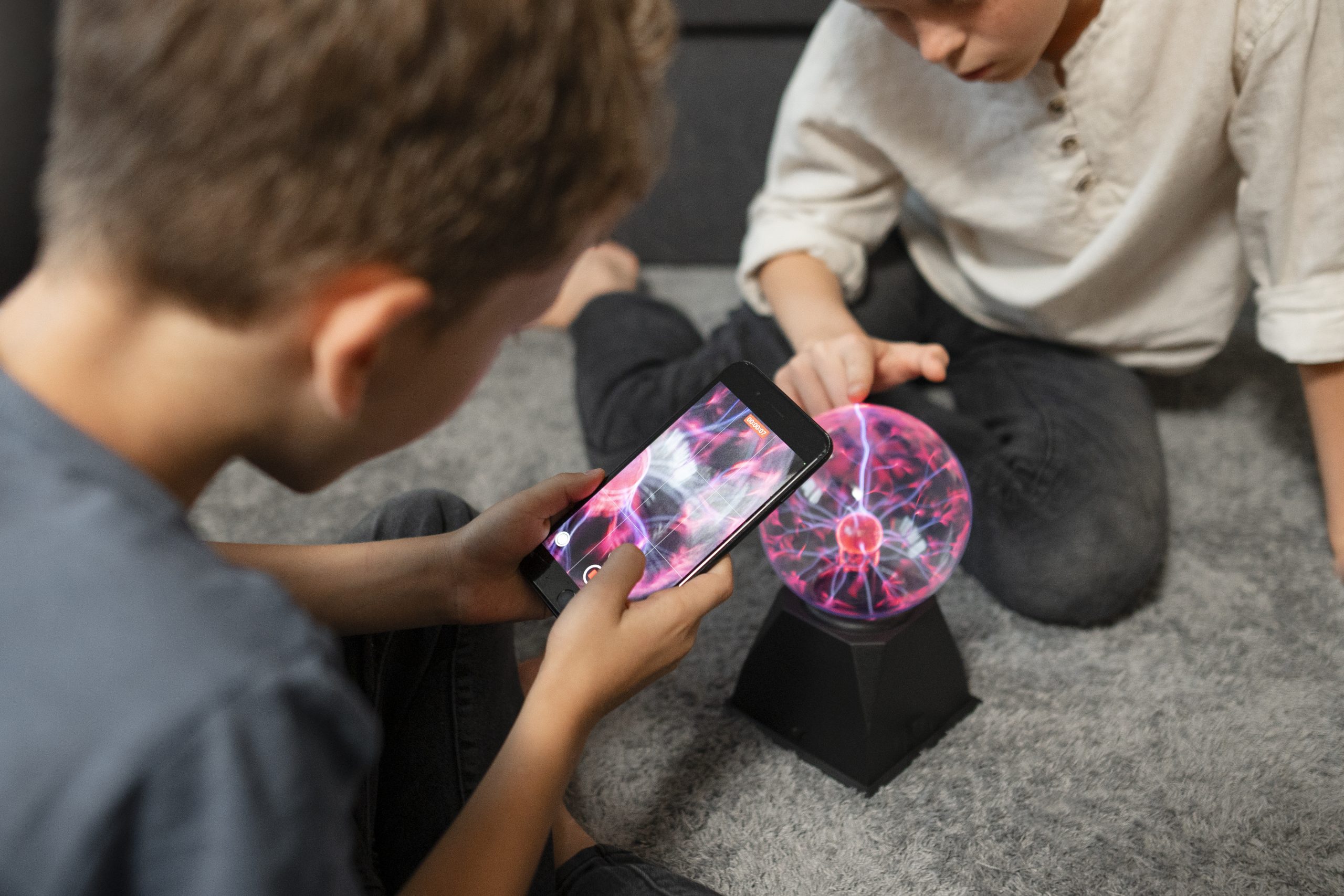 Kids Interacting With Plasma Ball Scaled