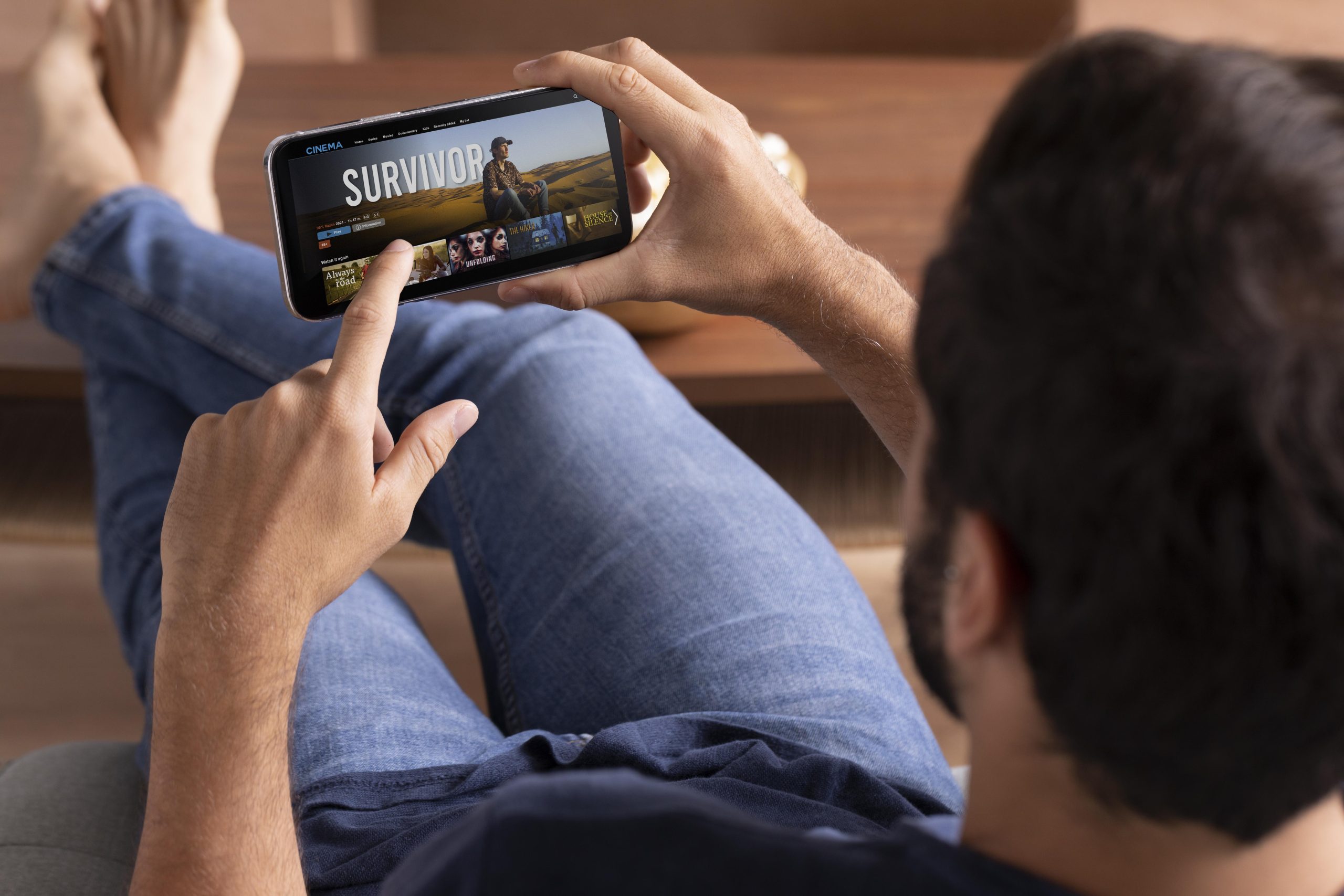 Man Watching Streaming Service His Phone Scaled